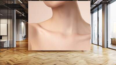 women's neck shoulder lips and collarbone on nude background Wall mural