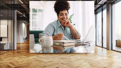 Attractive woman working from home Wall mural