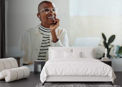 Joyful businesswoman with glasses laughing in a bright office setting, modern workplace, positive work environment Wall mural