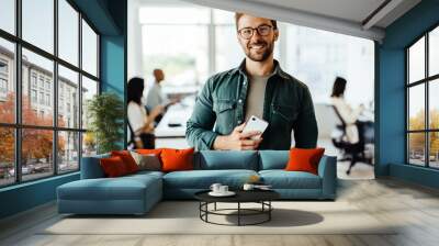 Portrait of a male professional standing in an office Wall mural