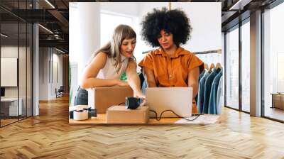 Thrift store owners preparing online orders in their shop Wall mural