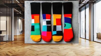 Minimalistic socks with abstract geometric prints, arranged on a concrete surface, modern design, urban fashion Wall mural