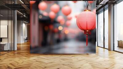 A vibrant close-up of a traditional red Chinese lantern hanging in a street, adding color and cultural significance to the scene, symbolizing festivity and celebration. Wall mural