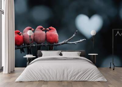 Image of four red birds perched on a branch captured at dusk with a soft-focus background featuring bokeh shaped like a heart, symbolizing togetherness and love. Wall mural