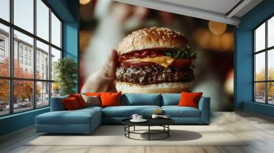 Santa Claus holding a juicy cheeseburger with lettuce, tomato, cheese, and sauce, capturing the delightful blend of holiday cheer and savory comfort food in a festive setting. Wall mural