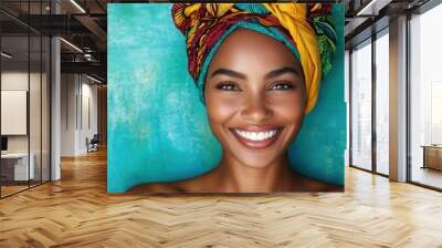 The captivating image features a woman with a radiant smile and a vibrant headwrap against a teal backdrop, symbolizing joy, positivity, and colorful cultural essence. Wall mural