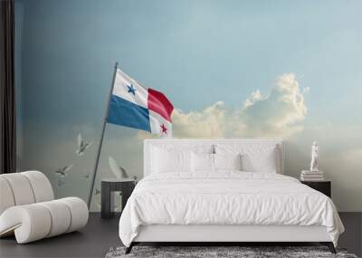 Panama flag waving with flying doves in beautiful sky. Panama flag for Republic Day and Independence Day. Wall mural