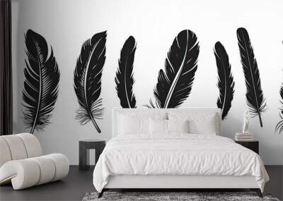 Feather icons. Set of black feather icons isolated on white background Wall mural