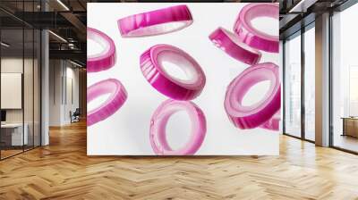 Floating raw red onion rings on white background Wall mural