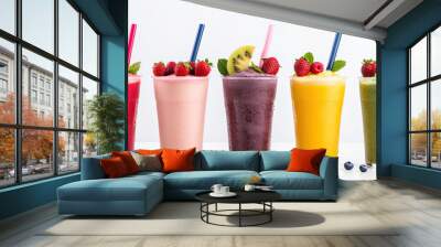 Four healthy fresh fruit and vegetable smoothies isolated on white background Wall mural