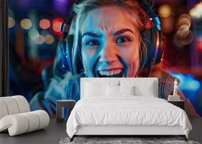 Image of excited girl playing video game on pc Wall mural