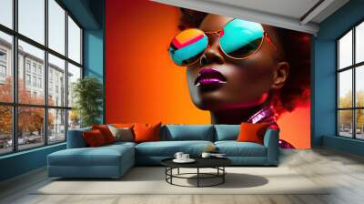 Portrait of a young african woman at studio. High Fashion female model in colorful bright neon lights posing  Wall mural