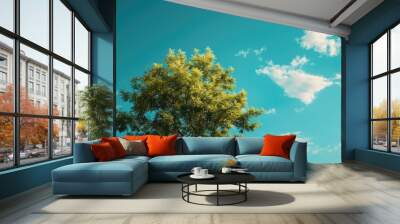 Green Tree Against Blue Sky Wall mural