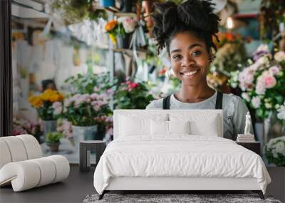 Smiling florist young black woman working in florist shop, looking at camera. Startup, small business, entrepreneur. Wall mural