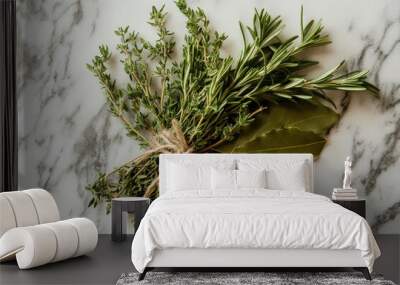 Rustic still life of fresh thyme and herbs on marble surface for culinary design. Wall mural