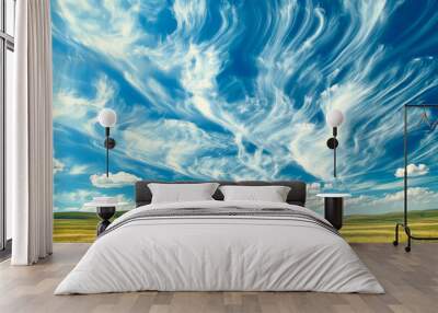 Scenic landscape of green meadow and beautiful blue sky with white clouds in motion. Wall mural