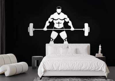 White logotype for gym and workout on black. Illustration of weightlifting athlete with a barbell in his hands. Wall mural