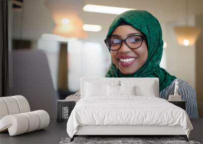 african muslim business woman working on laptop computer Wall mural