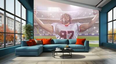 american football player celebrating after scoring a touchdown Wall mural