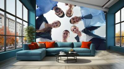 business people with their heads together Wall mural