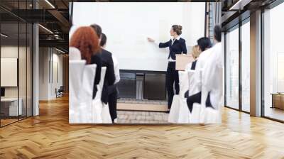 business woman giving presentation Wall mural