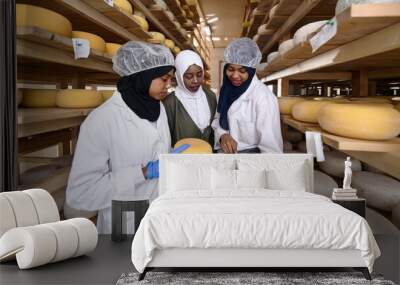 business woman team in local cheese production company Wall mural