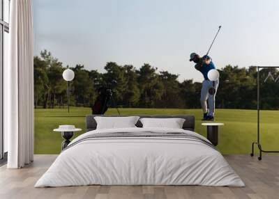 golfer hitting long shot Wall mural