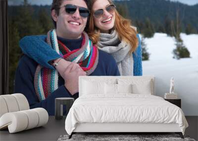 happy young couple having fun on fresh show on winter vacation Wall mural