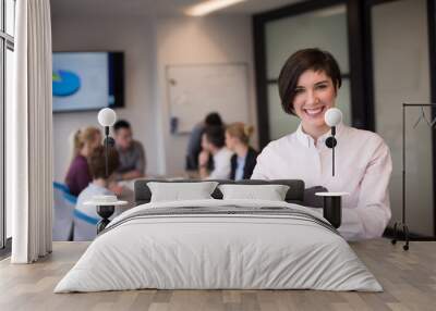 hispanic businesswoman with tablet at meeting room Wall mural