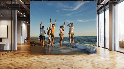 people group running on the beach Wall mural