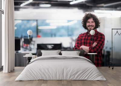 portrait of smiling male software developer Wall mural