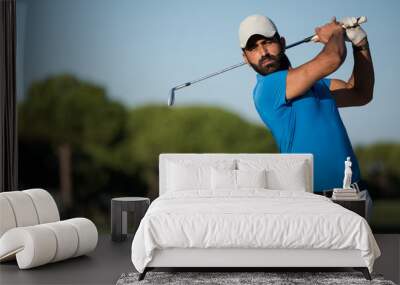 pro golfer hitting a sand bunker shot Wall mural