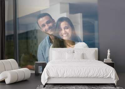 relaxed young couple at home Wall mural