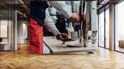 The waiter preparing coffee for hotel guests. Close up photo of service in modern hotels Wall mural