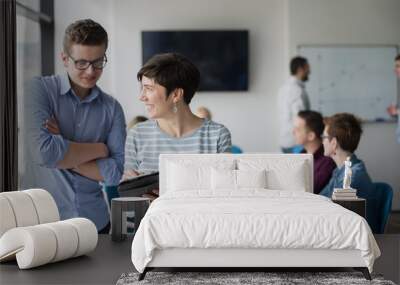 Two Business People Working With Tablet in office Wall mural