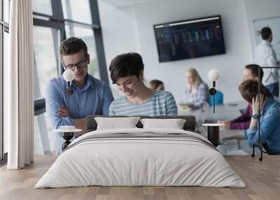 Two Business People Working With Tablet in office Wall mural