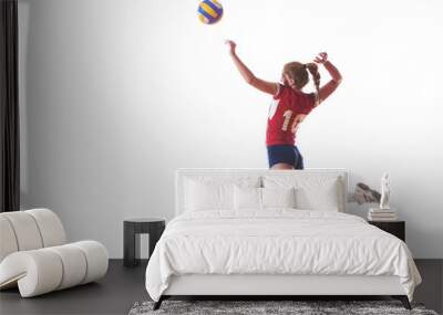 volleyball woman jump and kick ball isolated on white background Wall mural