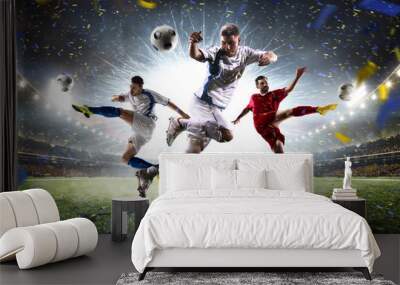 Collage adult soccer players in action on stadium panorama Wall mural