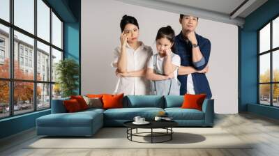 Asian family portrait posing on white background Wall mural