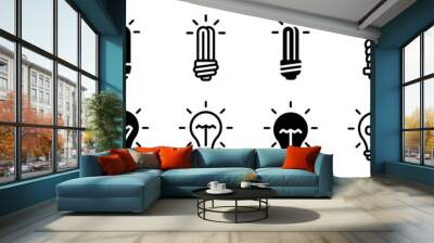 Light bulb vector icons. Electric lamp icon set. Glowing light bulb vector icon set. Wall mural