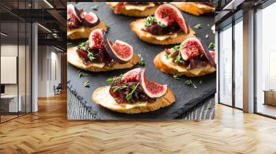 Canape with cheese, onion jam, figs and thyme Wall mural