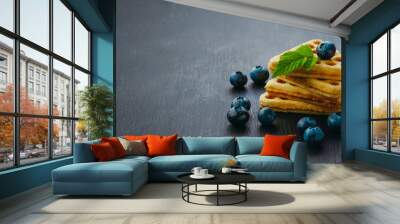  Fresh waffles with blueberries. Breakfast. Dark Background. Healthy food concept. Organic blueberries. Wall mural