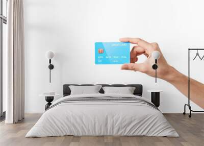 Credit card in hand on white Wall mural