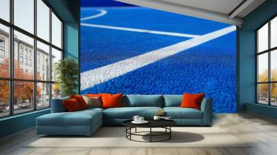 Vibrant Basketball Court with Crisp White Lines and Blue Background Wall mural