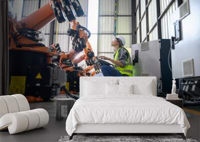 Maintenance engineer worker working with robotic machine automation Wall mural