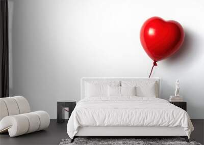 Red heart balloon on a white background with a string. Minimalistic romantic concept perfect for love, Valentine's Day, and celebration themes. Wall mural