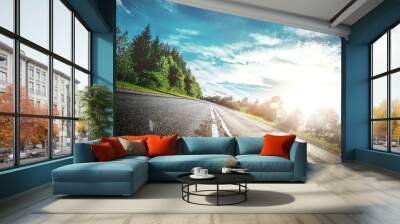 Sunrise beautiful road in forest Wall mural