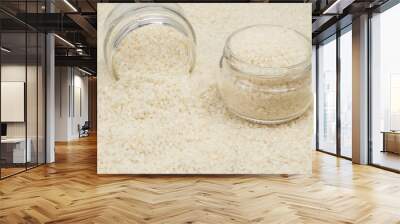 White round rice in two glass jars Wall mural