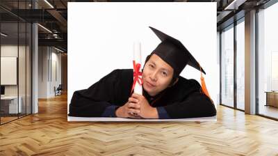 Asian Graduate man in cap and gown smile with certificated or diploma so proud and happiness in Graduation day,Isolated on white Background,Education Graduation Concept Wall mural