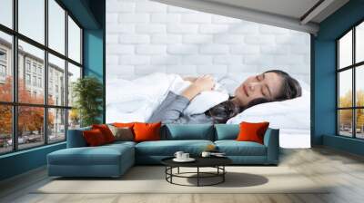 Beautiful Attractive Asian woman sleep and sweet dream lying on bed in cozy bedroom in the morning feeling so relax and comfortable.Healthy Young female sleep with bedtime at home.Healthcare Concept Wall mural